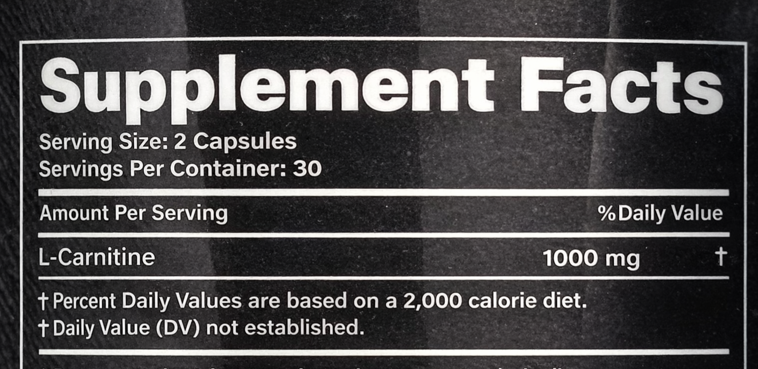 Supplement facts label with L-Carnitine information on a black background